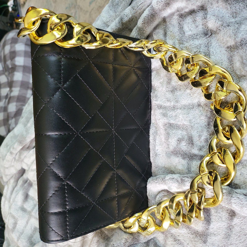 Black and gold purse